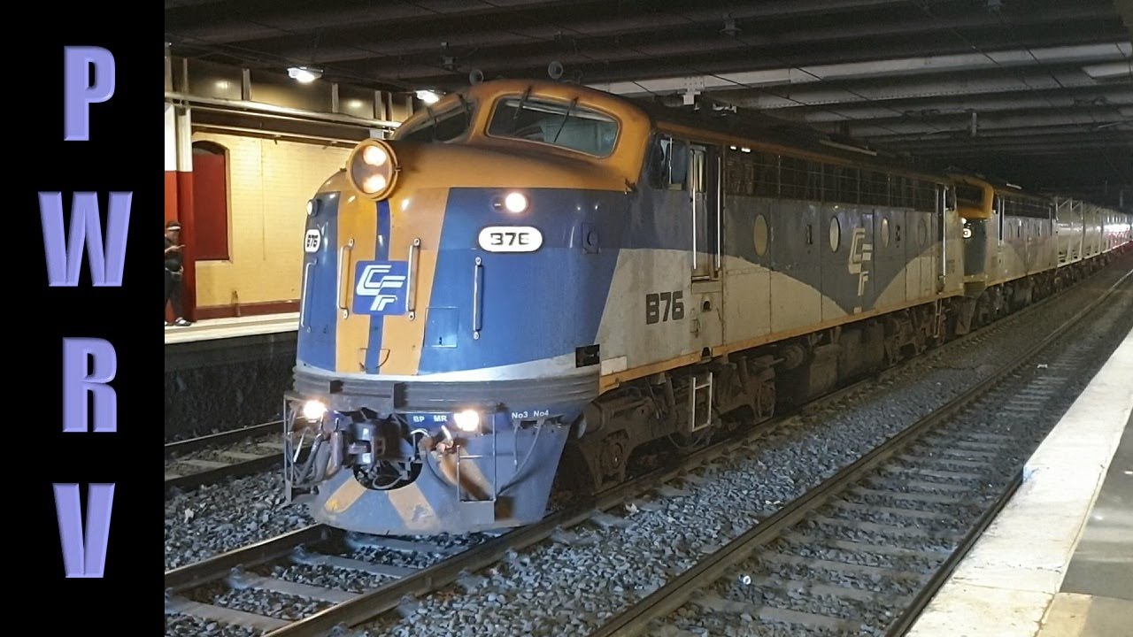 Australian Railways - Victorian B Class Diesels With a QUBE Cement Train Through Flinders Street