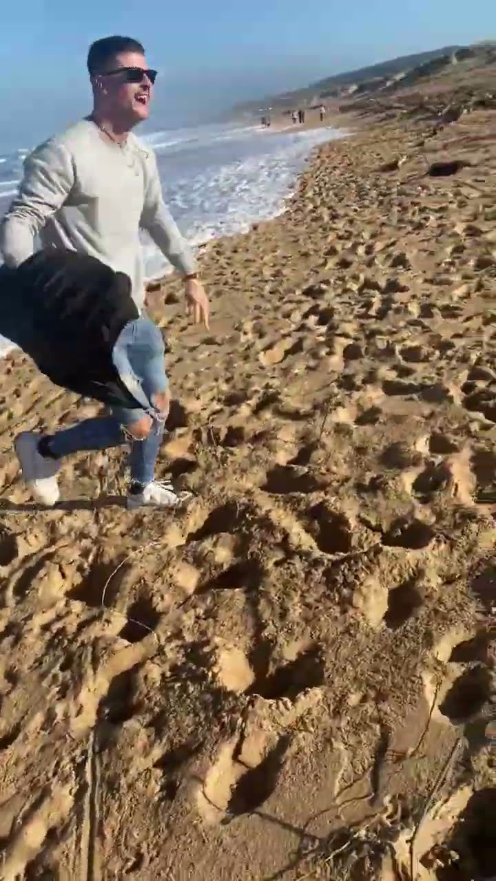 Man Hilariously Runs From Oncoming Wave || ViralHog