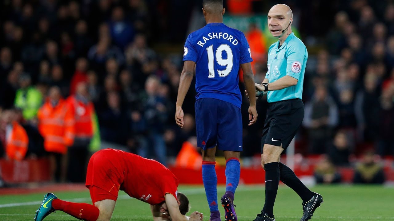 Marcus Rashford giving James Milner a concussion