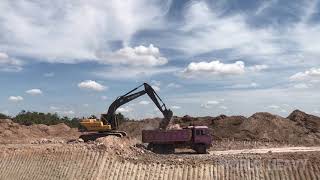 VOLVO 210 EXCAVATOR WORKING WITH DUMP TRUCK