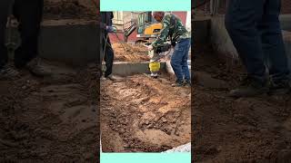 Watch these workers compact soil by hand #contructions #hardwork #groundworks #short