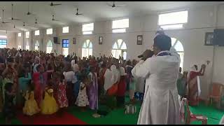 Fr, Thaddeus healing program at Katalguri parish.