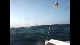 Trimaran Corsair 28 sailing in 4 meter waves to Helgoland