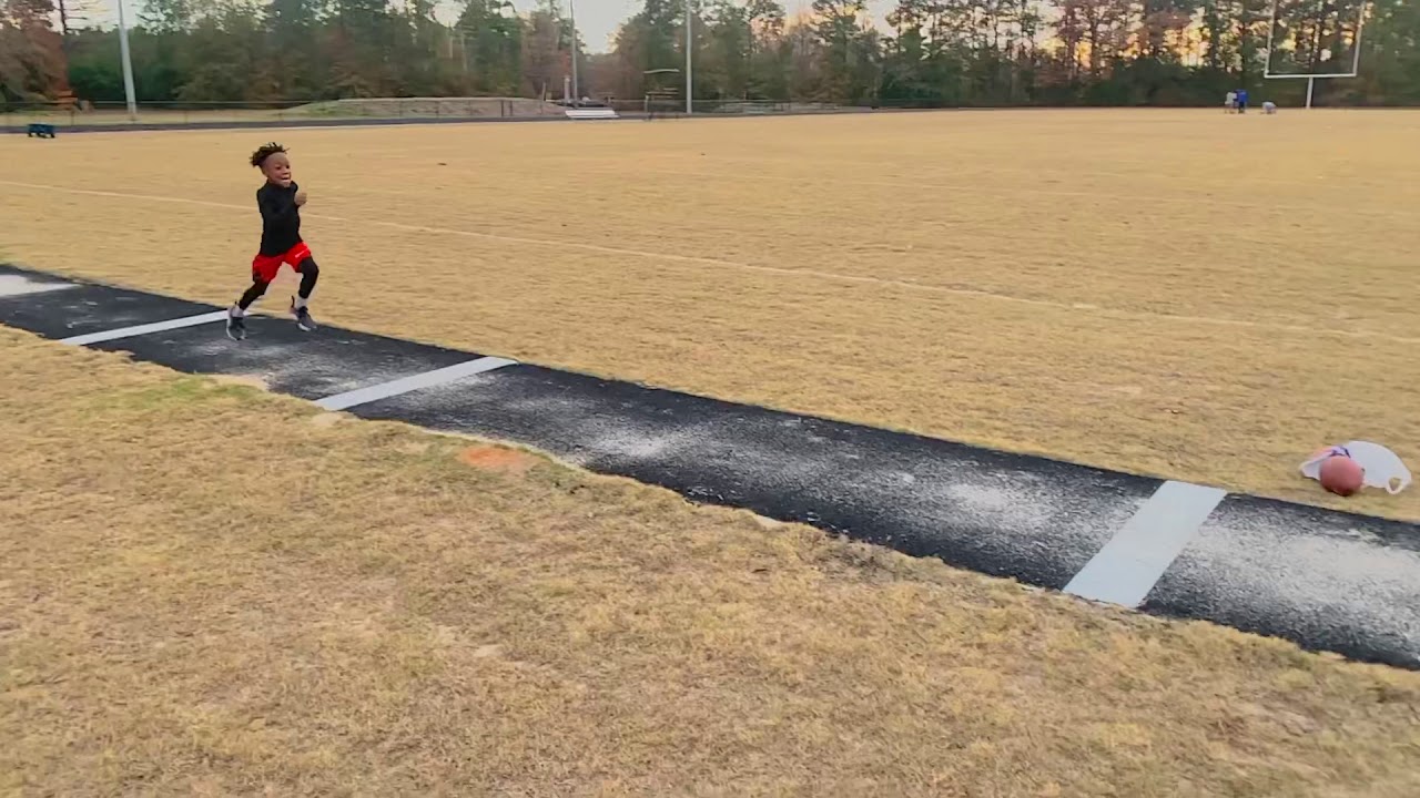  EJ 7 Yr Old Long Jump From 8ft Board Amazing Bounce YouTube
