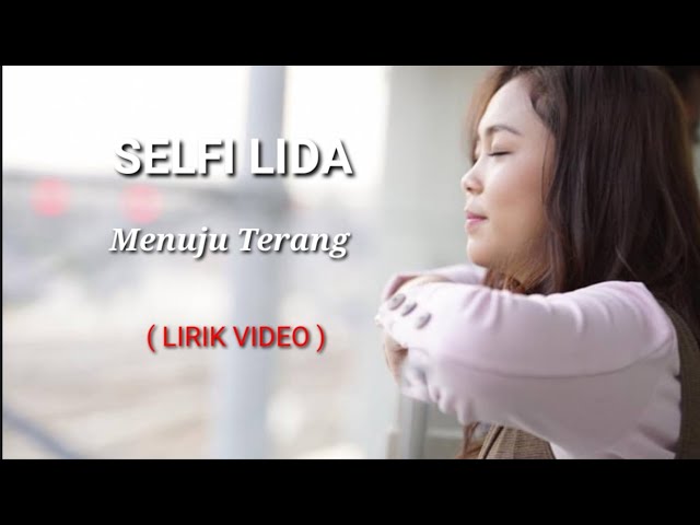 Selfi Lida - Menuju Terang ( Lirik Video ) class=