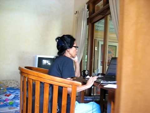 Tante Dewi H working at the Villa, Bali