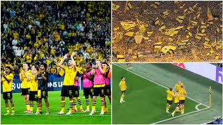 Dortmund Players Celebrate with The Yellow Wall of Fans After defeating PSG in Semi Finals
