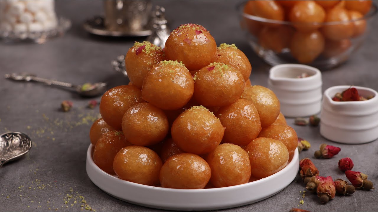 الأجواء الشتويه بدها حلويات في البيت تعطي أجواء دافئة  اسهل طريقه لعمل العوامه او اللقيمات