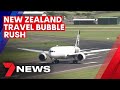 Victorians rush to book bubble flights to New Zealand | 7NEWS