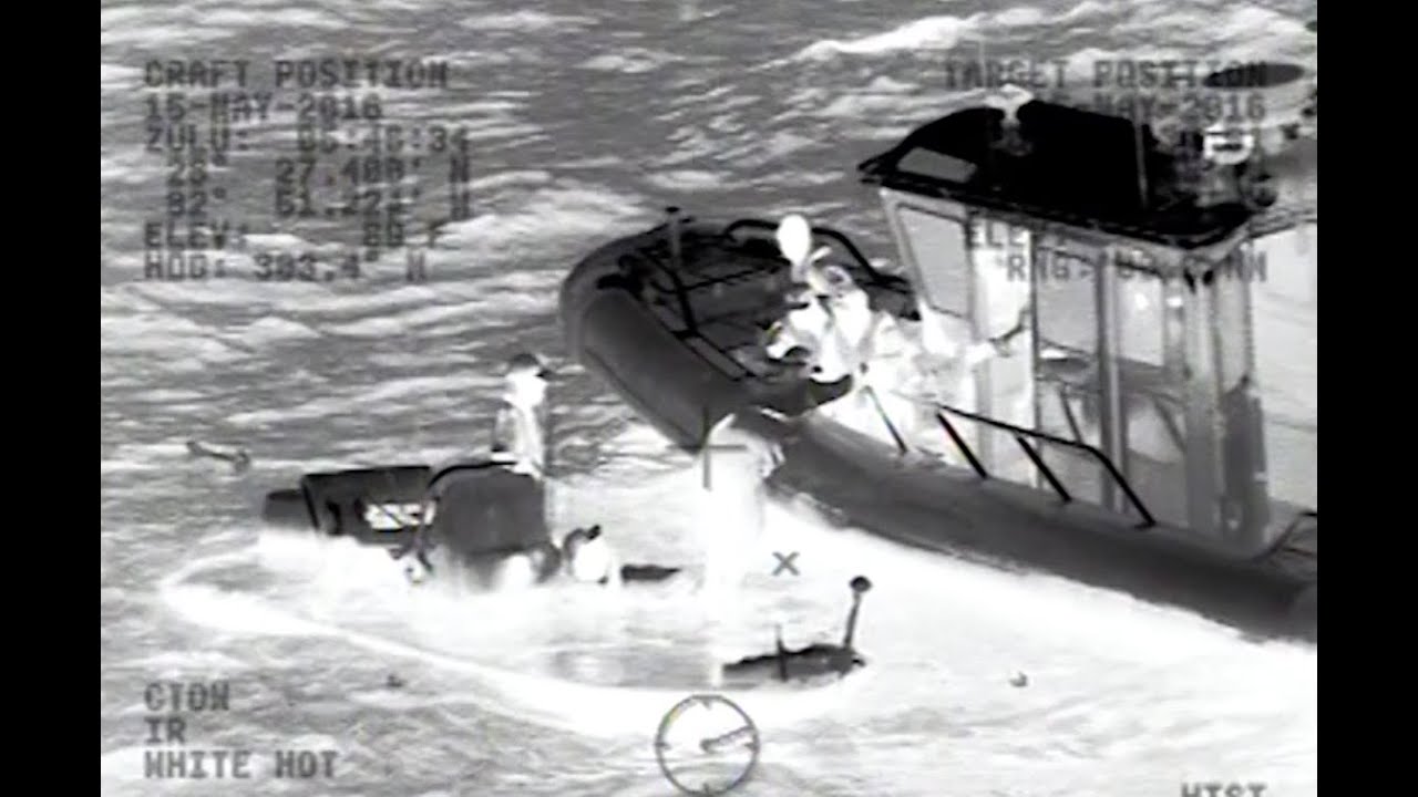 Coast Guard rescues two kids and two adults from sinking boat - YouTube