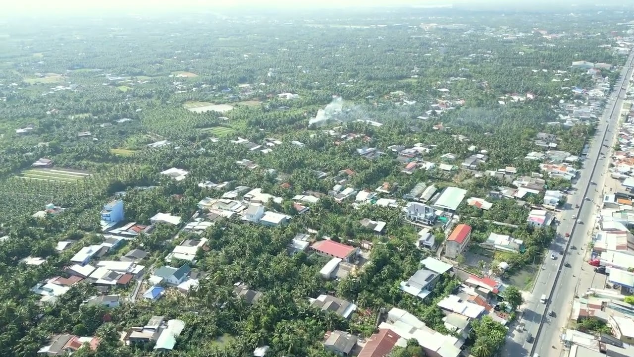 An aerial view of a city with lots of trees