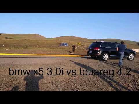 bmw x5   vs   touareg