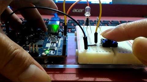 Arduino/Genuino 101 example to read button and turn ON/OFF LED