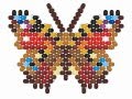 Weaving a peyote stitch Butterfly Inachis Io. Beading cartoon FOR LEFTIES