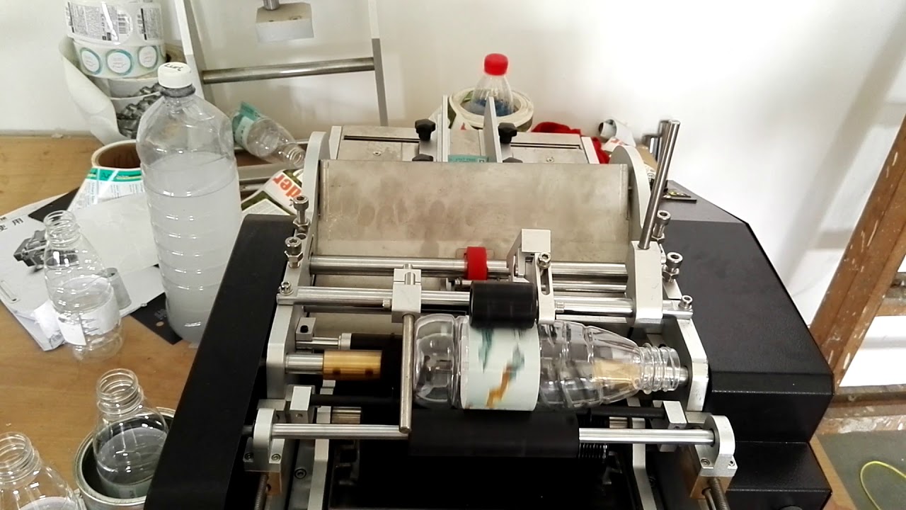 Installation video for manual wet glue labeling machine pure water bottle labels sticking machine