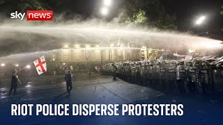 Georgia: Riot police disperse protesters outside parliament