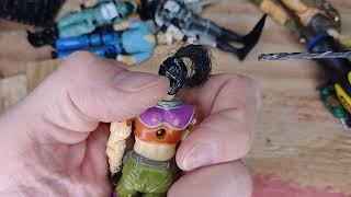 Fixing loose GI Joe joints with BONDIC and (bonus) drilling out a back screw.