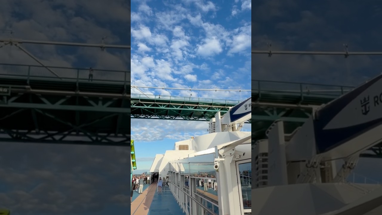 Ovation of the Seas sailing under the Lions Gate Bridge in Vancouver, BC