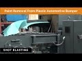 Shot blasting paint removal from plastic bumper with cast zinc shot blast media