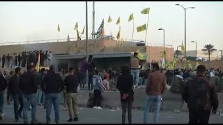 Famous WATCH LIVE: Scene outside the U.S. Embassy in Baghdad as militia supporters surround compound Wealth