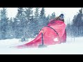Winter Camping in a Snow Storm, January Wilderness Backpacking in the North with Cold Tent.