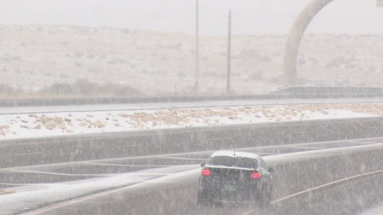 Roads snow packed and icy, schools close - YouTube