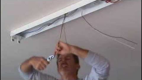 How to install a surface mounted fluorescent light fixture...Part 5