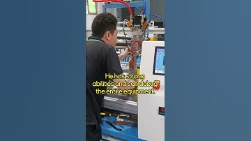 This young man is debugging the valve of the dispensing machine.