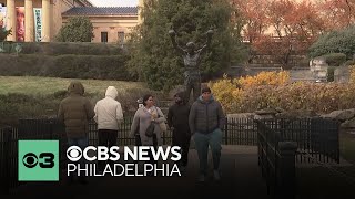 Philadelphia residents, visitors bundle up as cold and wind blast the region