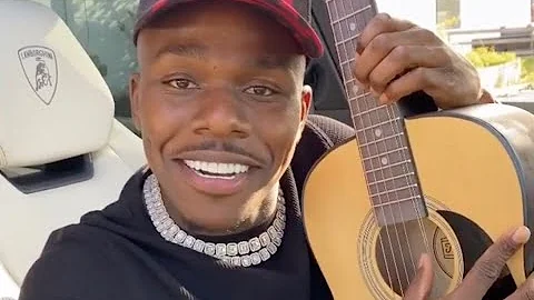 DaBaby Buys A Guitar To Match His New Lamborghini