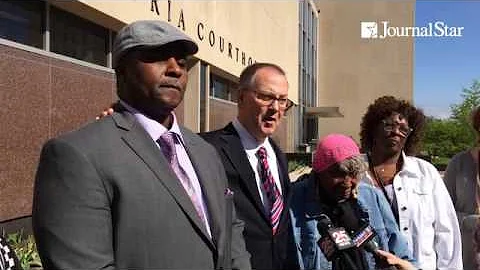Attorney Andy Hale speaks to the media after a jud...