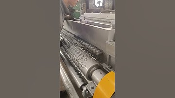 what are they doing ? adjusting the hexagonal wire mesh machine!!!