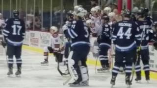 Tucson Roadrunners Captain Craig Cunningham collapse at center ice before opening face-off