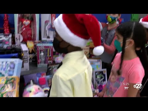 Brownsville Preparatory Institute delivers toy drive haul to Riley Elementary