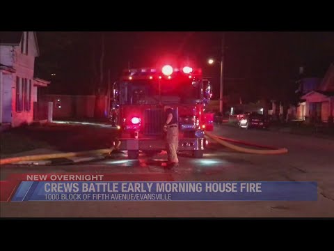Evansville firefighters battle early morning house fire