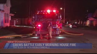 Evansville firefighters battle early morning house fire