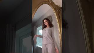 Girl Cleaning The Mirror