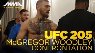 Conor McGregor, Tyron Woodley Share Moment at UFC 205 Weigh-Ins