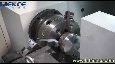 Flat bed metal CNC lathe machine with milling tool.