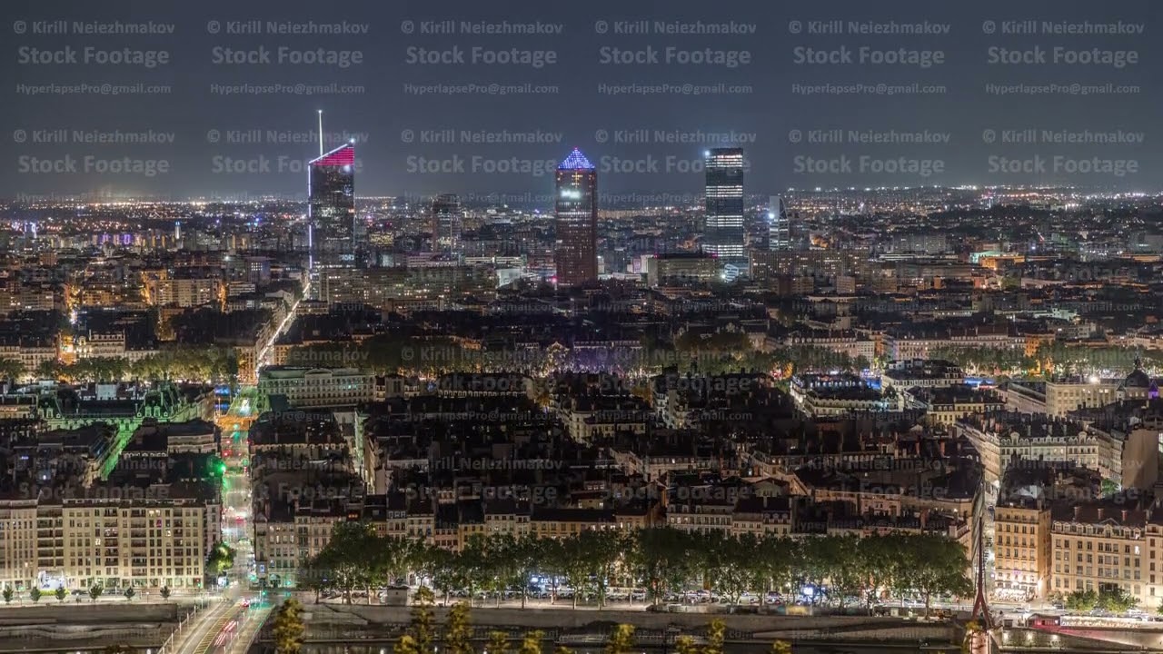 Panoramic aerial view of Lyon with skyscrapers from Fourviere Hill at night. France