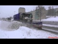 Snow Plows At Work During Heavy Snowfall