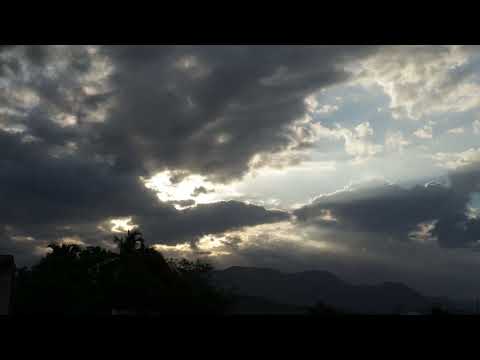 Sunlight shining through clouds timelapse