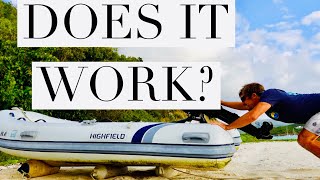 Using Rollers to Haul Large Dinghy Up the Beach