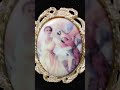 my design -Handmade porcelain cameo by another artist.  Set by me as a brooch  "Lady with her Birds"