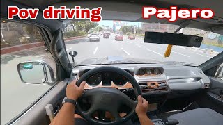 Sudut pandang pengemudi saat mengendarai Mitsubishi Pajero Fieldmaster AT Diesel.