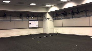 Two Quadrotor UAVs Cooperatively Transporting a Payload