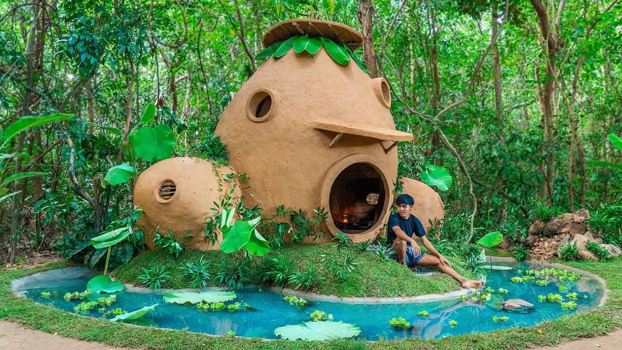 Building a warm survival shelter | Mountain House with clay, grass roof Surrounded by water