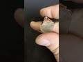 broken bracelet piece (glass, electroplated) remade into copper wire dragon weave evil eye pendant