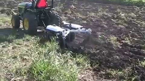 Kunz Till-Ease Model 543 Chisel Plow Pulled By A Sub-Compact Tractor