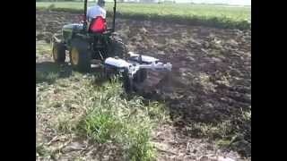 Kunz Till-Ease Model 543 Chisel Plow Pulled By A Sub-Compact Tractor